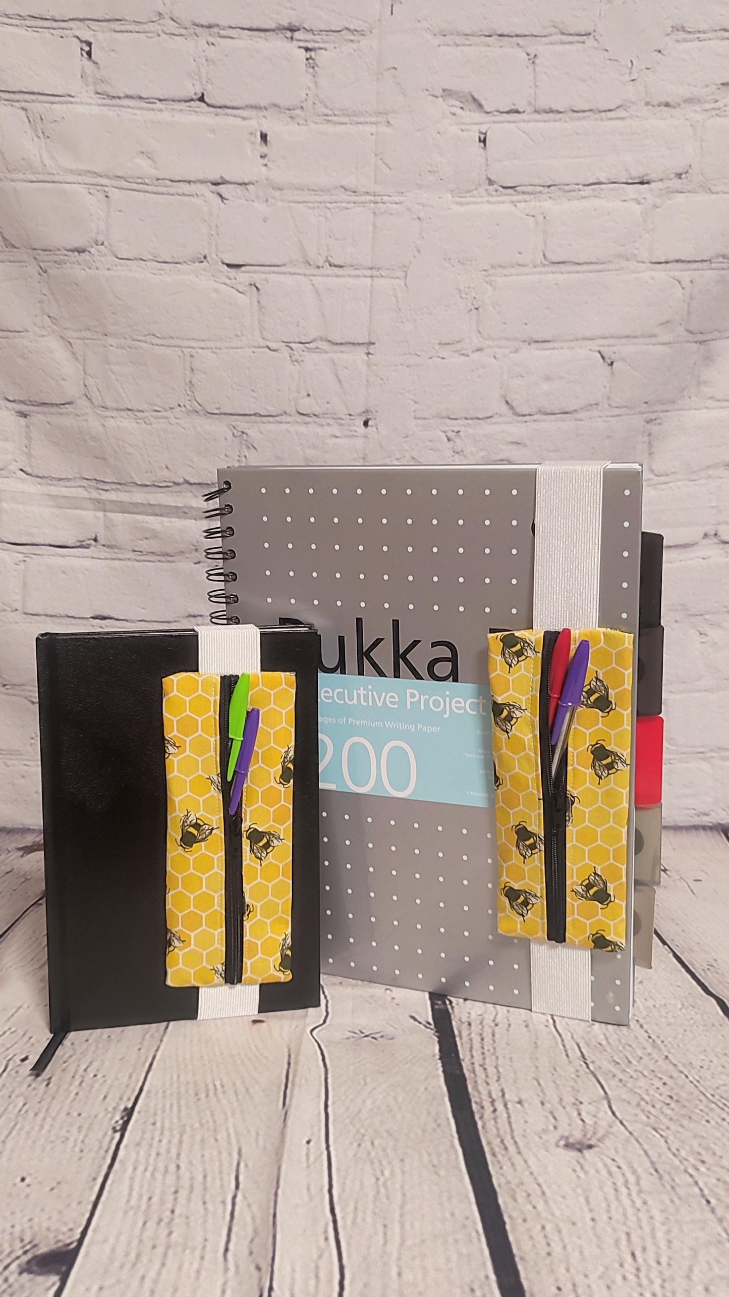 Notebook Pen Keeper