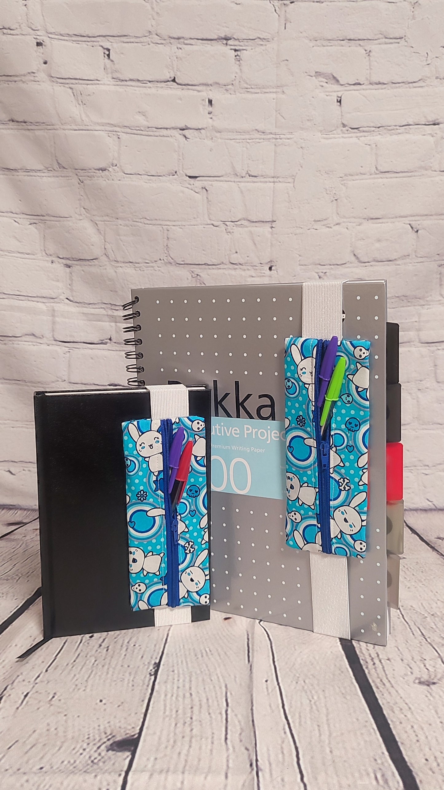 Notebook Pen Keeper