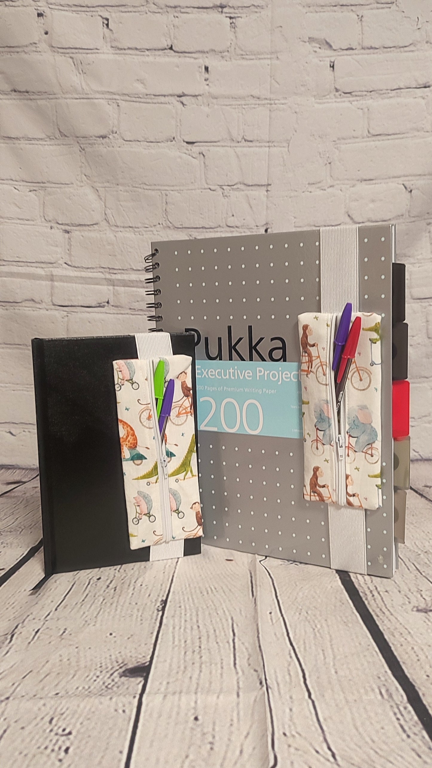 Notebook Pen Keeper