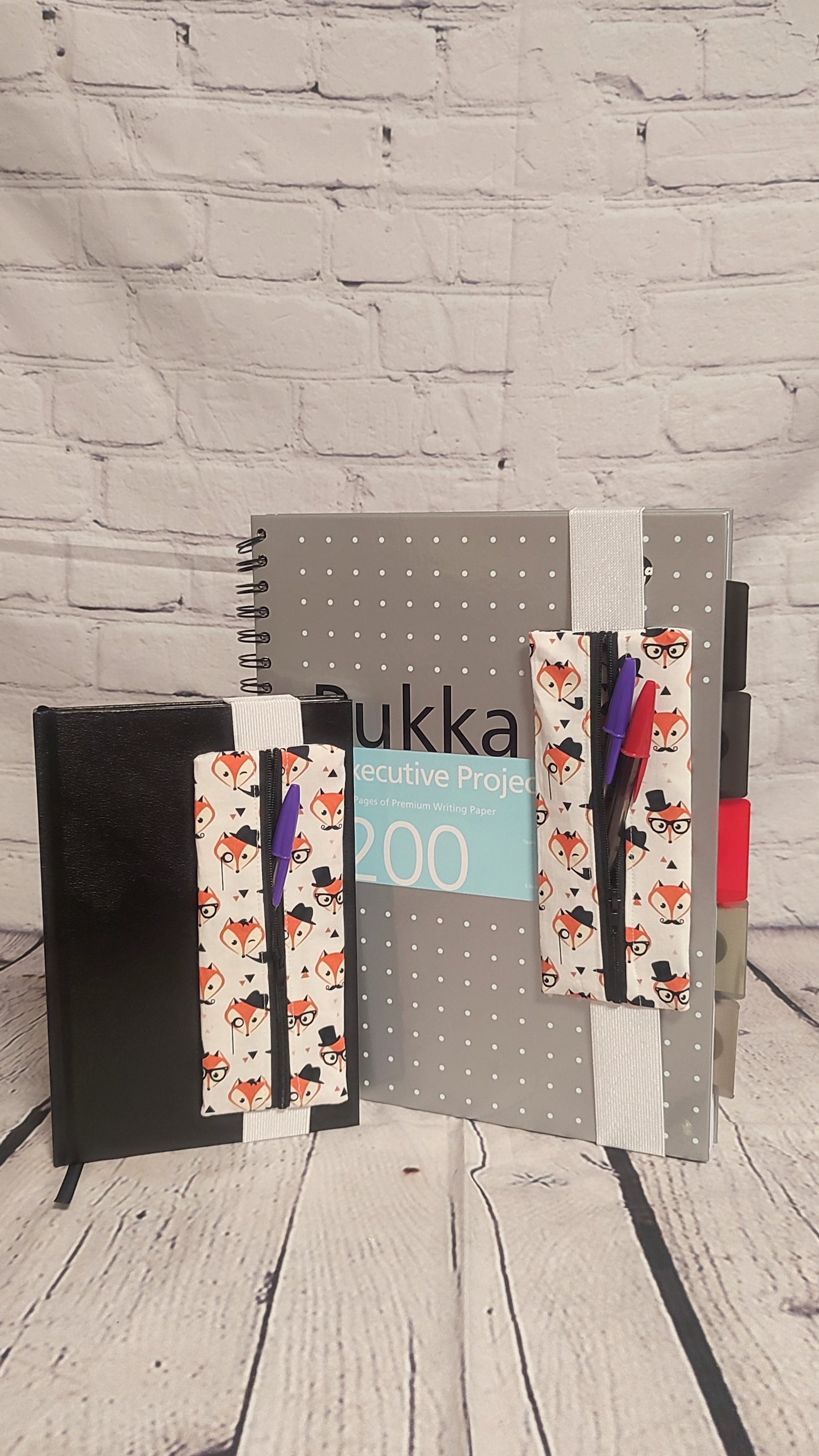 Notebook Pen Keeper