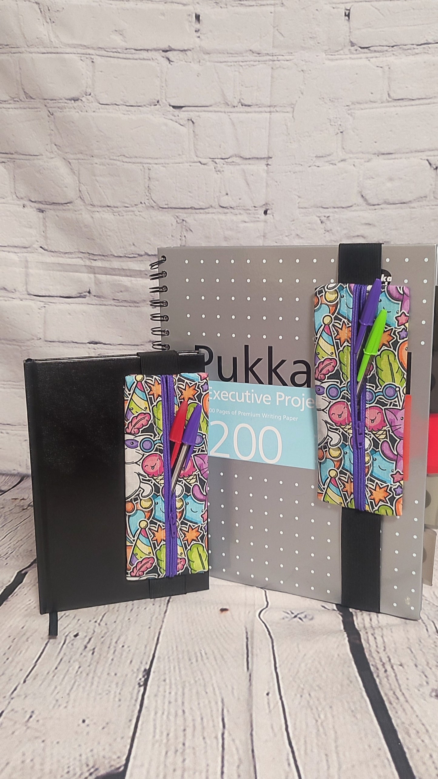 Notebook Pen Keeper